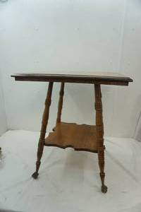 lot 297 image: Oak Parlor Table with Brass Feet