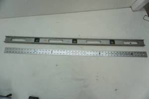 lot 429 image: Level and yard stick