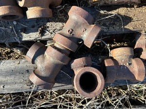 lot 502 image: 1 12 - 2 Misc. Cast Iron Fittings (F57, F58, F122, F118)