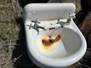 lot 402 image: Antique Half-round Cast Iron Bathroom Sink