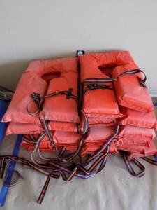 lot 6 image: 11- Orange Life Vests