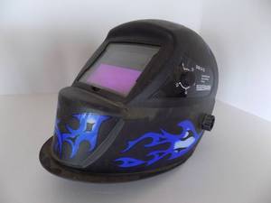 lot 26 image: Auto-darkening welding helmet from Chicago Electric Welding Systems