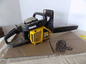 lot 72 image: Mac 3818 Chainsaw, Anti-Vibration Chain Is Off, Pulls Over With Chain And Cover (In Garage)