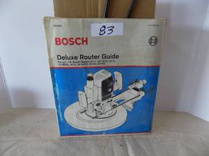 lot 83 image: Bosch Deluxe Router Guide, For Model 1611 And Other Items (In Garage)