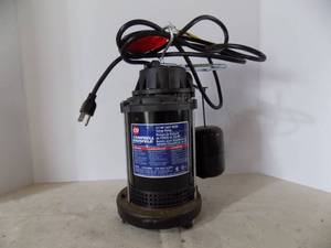 lot 120 image: 12 HP Cast Iron Sump Pump, Campbell House Field Looks Unused