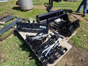 lot 4 image: Set of MIVA Skid Steer Attachments with Hardware - 2 Buckets, 1 Tilting Bucket, Rake, Mounts, Trench Bucket, Grapple