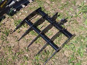 lot 28 image: 19 Mini Ex Rake Attachment