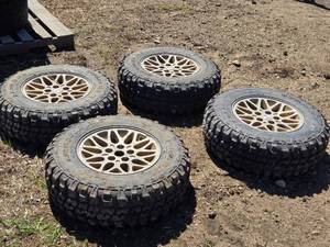 lot 49 image: Lot of 4 Federal Couragia LT23575R15 Off-Road Tires with Like New Tread on Jeep Rims