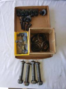 lot 87 image: Assorted Industrial Hardware 2x34 Bolts, Washers, Valve Assembly and Wheel Seals