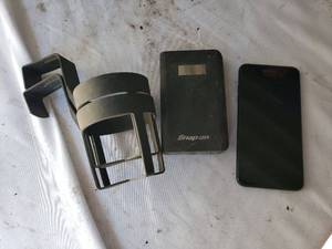 lot 141 image: Snap-On Portable Charger and LG Trac Phone