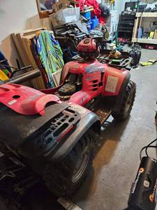 lot 3A image: Polaris Xplorer 400 4 Wheeler - Heated Grips, Carb Rebuild, New Iridium Spark Plug, Calibrated Oil Injection Pump, LED Headlight Upgrades, New Nylon Rope and Hook