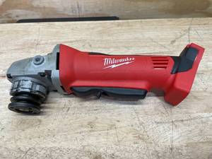 lot 24 image: Milwaukee M18 Cordless 4-12 Cut-off  Grinder Model # 2680-20 - Tool-Only