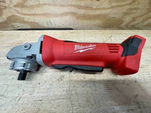 lot 25 image: Milwaukee M18 Cordless 4-12 Cut-off  Grinder Model # 2680-20 - Tool Only