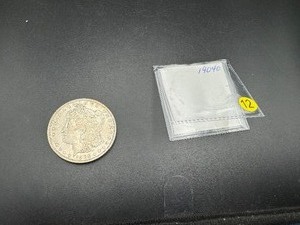 lot 12 image: 1904-O Morgan Silver Dollar