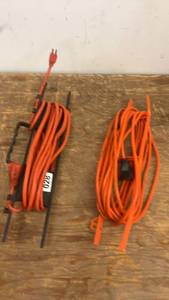 lot 28 image: Pair of Heavy-Duty Extension Cords with Plugs
