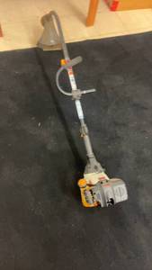 lot 30 image: Used Ryobi 4-Cycle Gas Grass Trimmer