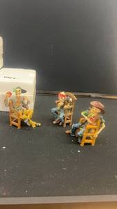 lot 81 image: Set of 3 Skeleton Cowboy Figurines with Chairs