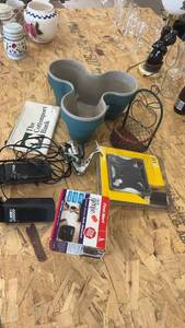 lot 157 image: Collection of Home and Tech Items Including Bark Deterrent, Planter, and Fishing Reel
