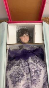 lot 242 image: Marie Osmond Collectible Porcelain Doll with Accessories