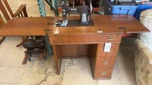 lot 252 image: Antique Domestic Sewing Machine with Built-in Wood Cabinet