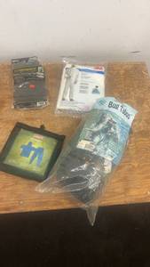 lot 268 image: Assorted Set of Outdoor Gear with Rainsuit, Safety Treads, Bug Taboo, and Paint Spray Coverall