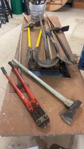 lot 212 image: Collection of Assorted Hand Tools Including Shovels, Pickaxes, and More