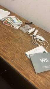 lot 216 image: Nintendo Wii Console Bundle with Controllers and Games