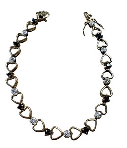 lot 28G image: Sterling Silver and Sapphire Heart Tennis Bracelet