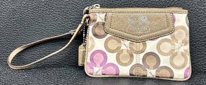 lot 97 image: Coach Madison Clover Print Brown, Cream and Purple Wristlet