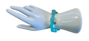 lot 43J image: 14k Gold Charm Bracelet with Blue Beads by Jewel MAK