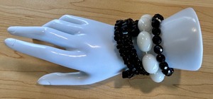 lot 53J image: Set of Beaded Bracelets with White Calcite and Black Stones