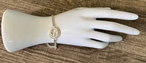lot 105C image: Sterling Silver Gucci Bracelet with Logo Pendant - 7.25 inches