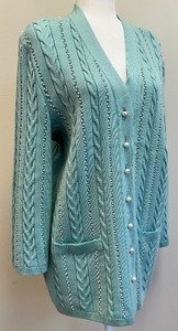 lot 56 image: Escada - Margaretha Ley Sea Foam Green Wool & Pearl Button Up Sweater - Size 40