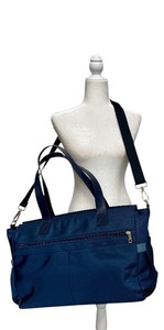 lot 108 image: Like NEW - Elegant Navy Blue Carryall Tote Bag with Adjustable Strap