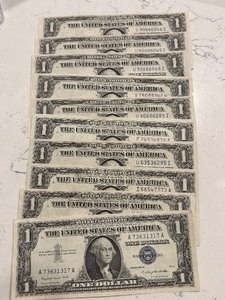 lot 74 image: 10 Blue Seal $1 Dollar Silver Certificates