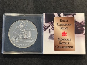 lot 23 image: 1997 Canada Silver Dollar Canada-Russia Hockey Series Coin