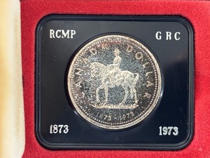 lot 98 image: 1973 Canada Silver Dollar RCMP