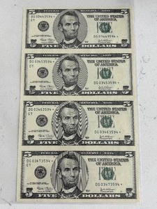 lot 174 image: Uncut Sheet of 2003 $5 Dollar Star Notes