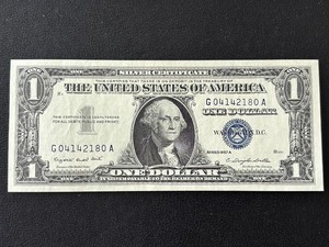 lot 126 image: 1957 A Blue Seal $1 Dollar Silver Certificate Uncirculated