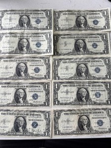 lot 128 image: 10 Blue Seal $1 Dollar Silver Certificates