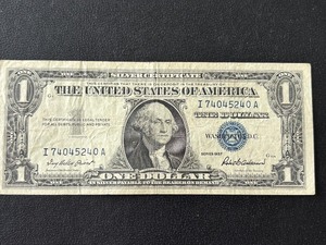 lot 137 image: 1957 Blue Seal $1 Dollar Silver Certificate