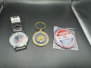 lot 12 image: 2020 Rarer 1st Term President Trump Memorabilia, Heavy Keychain, Button, 2nd Amendment Wristwatch