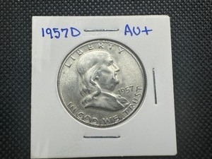 lot 23 image: 1957 D AU Franklin Half Dollar