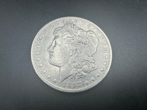 lot 28 image: 1887 O Mid Grade Morgan Dollar, Better Date