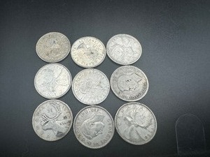 lot 52 image: (9) 80% Silver Canada Quarters