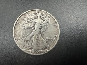 lot 54 image: 1940 Mid Grade Walking Liberty Half
