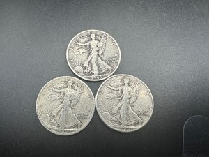 lot 55 image: (3) Mid Minus Walking Liberty Halves