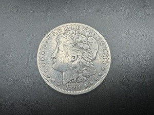 lot 62 image: 1891 O Morgan Dollar