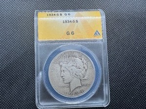 lot 91 image: 1934 S key Date Anacs Graded Peace Dollar