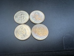 lot 97 image: (4) Uncirculated Dollars, (2) 2000P wSlight Toning, (2) Monroes
